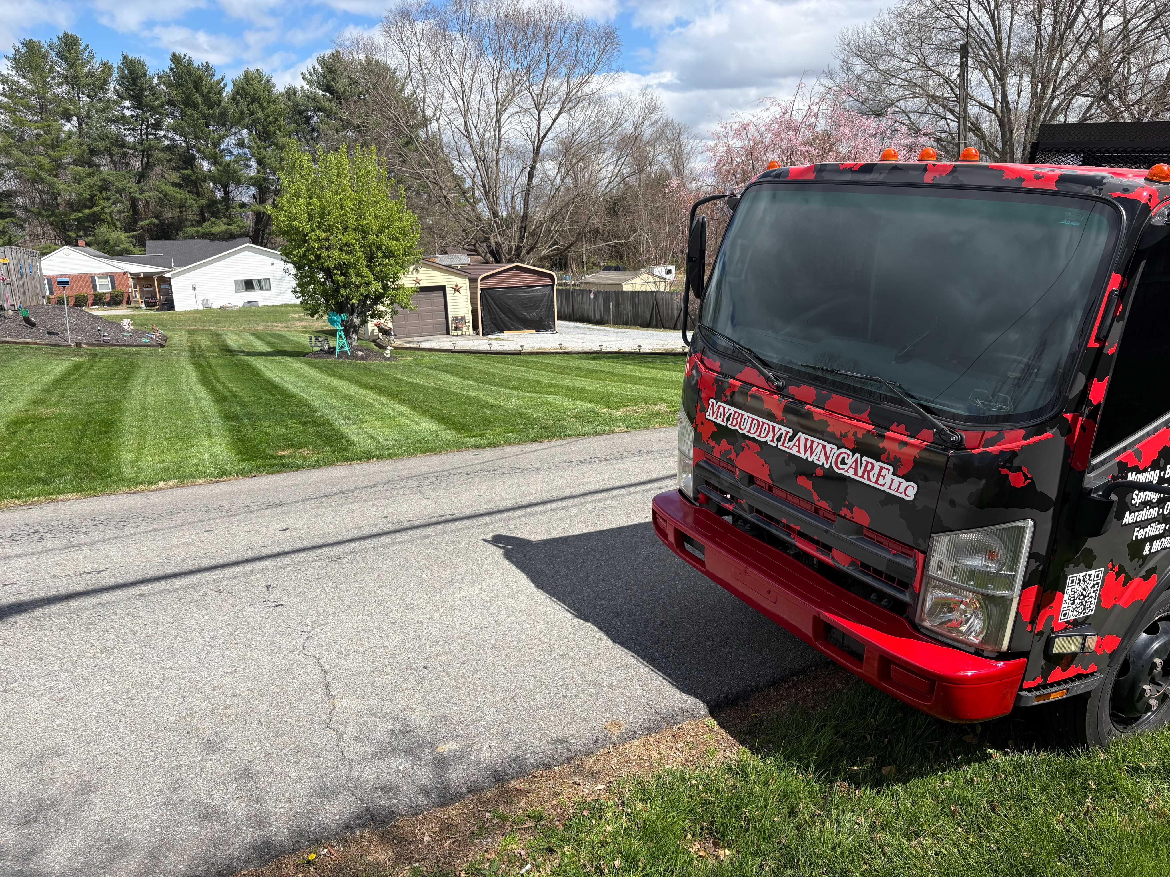 My Buddy Lawn Care LLC at work on a local property